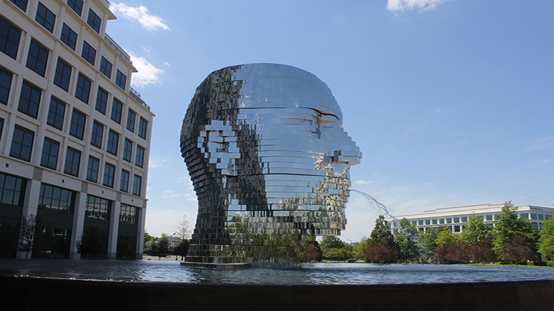 Metalmorphosis – Giant Metal Head Kinetic Sculpture in Charlotte